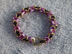 Listing is for the pictured item. This handmade bracelet is made with anodized aluminum rings and rubber rings. This is LGBTQ+ themed nonbinary. Chainmail Bracelet, Rubber Rings, Anodized Aluminum, Handmade Bracelet, Handmade Bracelets, Bracelet