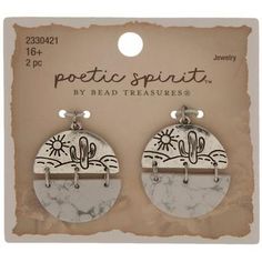 pair of earrings with cactus design on the front and back of each earring, in white marble