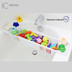 a bath tub filled with lots of toys in it's drainer and shelf