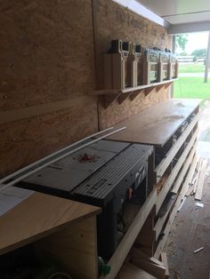 the inside of a building being built with plywood