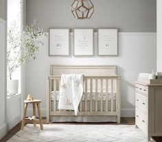 a baby's room is decorated in neutral colors