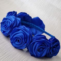 This royal blue  satin flowers hairband is hand decorated with 7 royal blue satin flowers.The diameter of the flower is approximatary 5.5cm.The metallic headband is  covered with satin ribbon,it is comfortable and adjust to fit most head sizes,from very young children to adults.Perfect for flower girls,bridesmaids or special accasions.   I make to order. Production time is 1-3 days. It is 100% handmade. Royal Blue Accessories, Metallic Headband, Royal Blue Hair, Blue Hair Accessories, Blue Headband, Blue Accessories, Satin Roses, Satin Flowers, Accessories Handmade