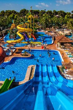 an overhead view of a water park with many slides