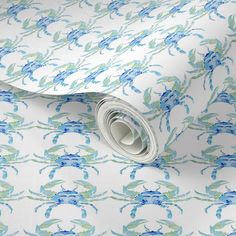 a blue and green floral wallpaper with leaves on white background, featuring an abstract design