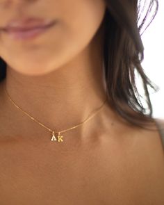 Mini initial necklace, perfect for adding a personal touch to any outfit. Dainty Initial Necklace - Perfect wearing alone or layering with your favorite necklaces. Super dainty & fun. Each initial measures approx. 6X8mm, You can add up to 5 Initials. Available in 14k Yellow Gold filled or sterling silver. --------------------------------------- SHIPPING UPGRADES You can find shipping upgrades options in the drop bar menu when you check out. + Within the U.S Regular First-class : 2-6 business A Intial Necklace, 2 Initial Necklace, Dainty Initial Necklace, Gold Letter Necklace, Necklace Initial, Necklace For Girlfriend, Initial Necklace Gold, Jewelry Fashion Trends, Bar Menu