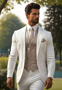 a man wearing a white suit and tie