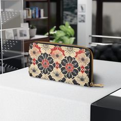 This Japanese Motif Zipper Wallet is a stylish and functional accessory with vibrant colors and durable materials. Perfect for those who appreciate Japanese design and need a convenient way to store cash, cards, and coins. Ideal for anyone looking for a unique and practical wallet to use in their daily life. Product features - Vibrant colors with crisp designs - Made of 100% PU leather - Durable zip and hardware - Gold color thread stitching detail - Multiple pockets for organization Care instru Traditional Japanese Design, Design Japonais, Japan Design, Clip Wallet, Card Bag, Functional Accessories, Money Clip Wallet, Japanese Design, Zipper Wallet