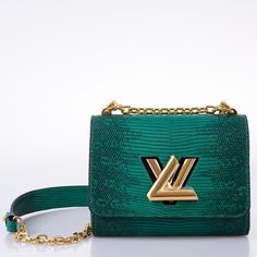 Crafted of luxurious lizard skin, this Twist PM is a glamorous evening companion. The glossy exotic leather glows like a jewel, set off by a signature LV Twist lock in gleaming metal. The sliding chain converts easily for shoulder or cross-body wear. Condition: Store FreshMeasures: 7.5 x 5.9 x 3.5 inchesMaterial: LizardGoatskin liningGold-color hardwareLV Twist-lock signatureSignature LV engraved hinged D-ring1 Large inside compartment1 Flat pocket for pull-out mirrorChain: Sliding, not removabl High-end Green Shoulder Bag, High-end Green Shoulder Bag With Gold-tone Hardware, Luxury Green Bag With Detachable Strap, Luxury Green Shoulder Bag With Dust Bag, Luxury Everyday Shoulder Bag, High-end Green Evening Bag, Luxury Green Top Handle Shoulder Bag, Luxury Green Shoulder Bag For Evening, Luxury Green Bags