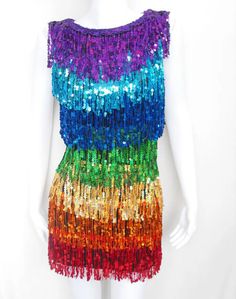 a mannequin wearing a multicolored sequin dress