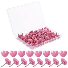 pink heart shaped push pins in a clear plastic box with white background and overlay