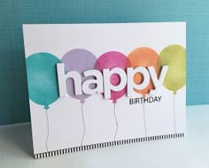 a birthday card with balloons and the word happy written on it's front side