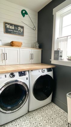 a washer and dryer in a small room