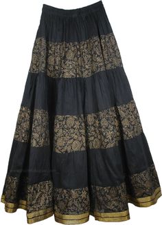 Black Cotton Festive Long Skirt - This is a quality cotton crinkle long skirt with golden brocade-lace work and a henna style floral rendition in hand block print. The flowing skirt is half lined to give it a full voluminous look and it features a stretchable elastic waistband for a flexible fit. A gorgeous golden ribbon encircles the hemline which gives the skirt a festive look. This skirt surely looks beautiful as it highlights the contrast in woodsmoke black and golden (see detailed picture b Tall Skirt, Henna Style, Summer Fashion Ideas, Garden Wood, Wedding Skirt, Hippie Look, Scarf Shirt, Trendy Skirts, Party Skirt