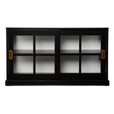 a black and white cabinet with glass doors