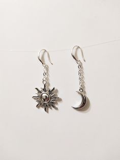 ◆ Earrings with crescent moon and sun these earrings are very beautiful and original the moon represents female entities and consequently fertility, while the sun represents the male entities. The moon measures only 0,629921 inches while the sun 1,06299 inches they are about 2.12598 inches long and are silver plated. ♡ In my shop there are many handmade jewelry for all tastes, come and watch them you are welcome! ♡ ❤ Do you need a custom order? ❤ You can enter a free note to send together with y Celestial Sun And Moon Dangle Jewelry, Celestial Half Moon Single Earring, Celestial Crescent Earrings For Everyday, Celestial Sun Design Dangle Jewelry, Everyday Celestial Crescent Earrings, Symbolic Dangle Earrings With Sun And Moon Design, Symbolic Sun And Moon Dangle Earrings, Dangle Earrings With Sun And Moon Design For Gift, Sun And Moon Design Dangle Earrings For Gift