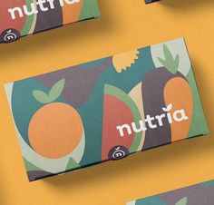 three boxes with different types of fruit on them, one for nutria and the other for oranges