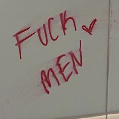 graffiti written on the side of a white wall that says, fuch men?