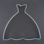 the outline of a dress on a chalkboard