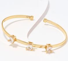 With a touch of sparkle and a classic look, this Omega flat cuff bangle stands out. Pair it with a favorite watch or other bracelets to enhance the look. Cuff Bangles, Princess Cut, Classic Looks, Prong Setting, Cubic Zirconia, Jewelry Bracelets, Bangles, Sparkle, Yellow Gold