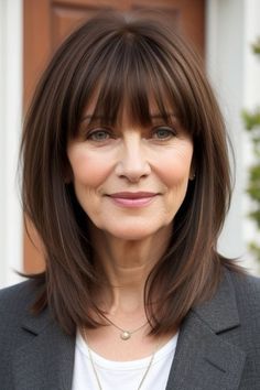 Age Gracefully with These Bold & Sassy Hairstyles Hair With Bangs Over 50, Shoulder Length Hair With Layers, Bangs For Women Over 50, Bangs Over 50, Sassy Hairstyles, Gray Highlights, Medium Length Hair With Bangs, Long Bob With Bangs