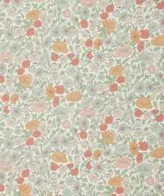 an old fashioned wallpaper with flowers and leaves on the side, in pastel colors