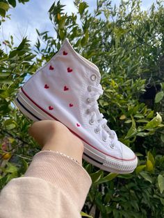 These White Valentine's Day Converse are hand embroidered using quality thread. This item is non-returnable and non-exchangable so please make sure the right size is chosen when ordering. The shoes are US sizing so please take that into consideration as well. A sizing chart has been provided if you need help figuring out your size. I would not like to compromise the quality of your customs so please understand that I may not always be able to ship them out to an earlier time. The placement of th Heart Me Converse, Preppy Heart Shoes, Womens Converse Hearts, Platform Converse Hearts, Heart Wallpaper Converse, Converse Shoe Writing, Love Heart Converse, Writing Converse, Converse Embroidery