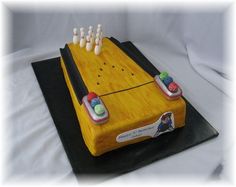 a cake that is shaped like a bowling board