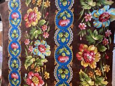 a table cloth with colorful flowers on it