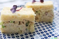 two pieces of food sitting on top of a blue and white plate