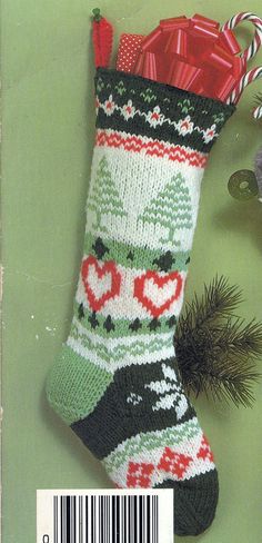 a knitted christmas stocking with candy canes