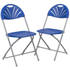 two blue folding chairs sitting next to each other