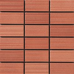 a close up view of a brick wall made out of red clay bricks, with black lines on each side