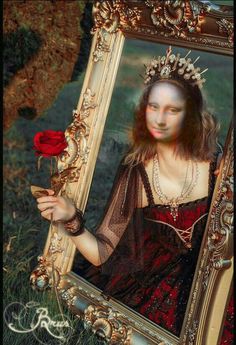 a woman in a red dress holding a rose and looking into a gold framed mirror