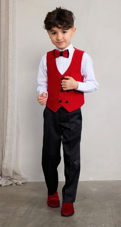 Tie Town takes the tie game to the next level with our drip and dapper tuxedo sets!  Tie Town Boy's Shawl Lapel Velvet Tuxedo is 4-pieces:  Vest, Pants, Dress Shirt, and matching Bow Tie!  This drip and dapper tuxedo set is an exquisite poly-rayon blend. Tuxedos are slim fit, so make room for allowances!  Wear for weddings, formal events, and the daily dapper!  Care instructions: Dry Clean Only Fitted Sleeveless Tuxedo Set, Formal Tuxedo Style Vest, Formal Tuxedo Style Sleeveless Vest, Sleeveless Tuxedo Suit For Party, Sleeveless Tuxedo Vest For Formal Events, Red Frock, Vest And Bow Tie, Boys Tuxedo