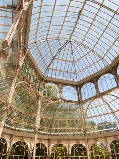 the inside of a large building with many windows and arches on it's sides