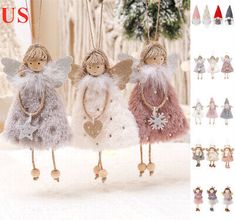 three angel ornaments hanging from the ceiling in various colors and sizes, including pink, red,