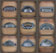 nine different styles of door knobs on a wooden surface, each with an ornate design