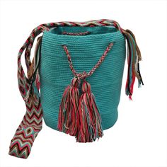 ★100% COTTON ★Our bags are sourced directly from the Wayu'u community in Guajira where each bag, depending on its complexity, can take up to 5 days to produce, 100% handmade by the women of the Wayuu tribe. ★Unique design in each bag, large capacity, you can comfortably store your laptop, iPad, phone, wallet, cosmetics, umbrella and other things. Perfect for use in office, school, dating, travel or any other daily occasions. ★With each purchase we help the Wayuu people to its development and evolution. ★Approximate dimensions: H: 8inch x W: 9inch x D: 7inch Straps: 16 - 20inch. Medium Size.It can be washed in a washing machine with a soft program and at a low temperature. Woven Pouch Bag For Travel, Woven Travel Pouch Bag, Green Backpack Shoulder Bag Gift, Green Backpack Shoulder Bag For Gift, Green Backpack Style Shoulder Bag Gift, Green Woven Bag For Gift, Artisan Blue Pouch Bag, Eco-friendly Handmade Backpack Bag, Turquoise Pouch Shoulder Bag For Travel