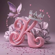 the letter k is surrounded by pink flowers and butterflies with a tiara on top