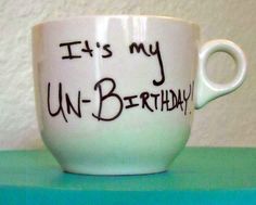 a cup with writing on it that says it's my un - birthday