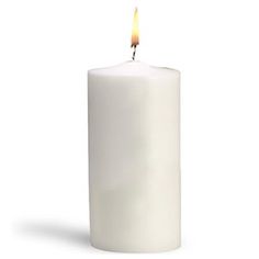 a white pillar candle with a single lit candle in the middle on a white background