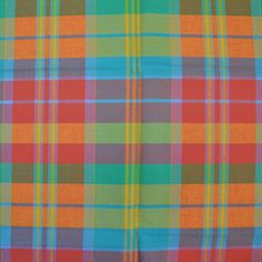 an orange, green and blue plaid fabric