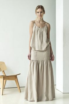 "White linen slip top or sleeveless linen blouse is light, breathable and super crisp - a must-have during the warm season. This linen cami has a simple slip silhouette but with a little pleat detail by the décolleté, which gives this white camisole a character. It's simplicity really is the key: it gives you the room for pairing it with anything - skirts, pants, shorts, flats, heels, espadrilles and for any occasion. ABOUT US LINEN ID was born from desire to embrace things that actually matter. Beige V-neck Tank Top For Summer, Chic Linen Camisole For Day Out, Beige Camisole For Beach, Spring Sleeveless Linen Camisole, Beige Linen Tank Top For Beach, Sleeveless Linen Tank Top For Summer, Linen Camisole For Day Out, Beige Cotton Camisole For Vacation, Chic Linen Tank Top With Adjustable Straps