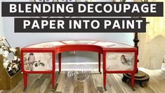 a red desk with birds painted on it and the words blending decoupage paper into paint