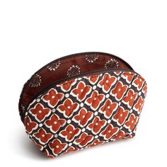 Our Mini Dome Cosmetic is perfectly sized to fit in your purse, handbag, or travel tote, making it ideal for carrying your essential makeup items on the go without taking up too much space. Whether you're touching up your makeup during the day or packing light for a weekend getaway, our compact bag offers the perfect solution for keeping your beauty essentials close at hand. Vera Bradley Mini Dome Cosmetic Bag in Moorish Orange/Black Brown Cosmetic Bag With Zipper Pouch For Everyday Use, Brown Pouch Cosmetic Bag For Everyday Use, Everyday Brown Pouch Cosmetic Bag, Foldable Pouch Cosmetic Bag For Travel, Foldable Pouch For Everyday Use, Compact Multicolor Travel Bags, Packable Pouch For Travel, Packable Rectangular Bags For Gifts, Versatile Compact Bag For Everyday Use