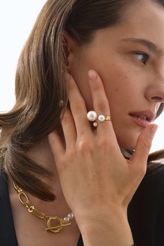 Discover the beauty of our Open Pearl Ring, featuring triple white pearls that create a stunning focal point. This elegant statement ring is designed for women who appreciate timeless jewelry with a modern twist. The open design allows for an adjustable fit, ensuring comfort and versatility for everyday wear or special occasions. Perfect as a wedding ring or a birthday gift, this piece is not only a beautiful accessory but also a thoughtful gesture for someone special. Its classic yet contempora Her Wedding Ring, Ring Elegant, Birthday Ring, Open Design, Timeless Jewelry, Perfect Gift For Her, Ring For Women, Pearl Ring, Statement Ring