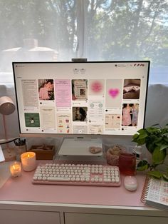 a desktop computer sitting on top of a pink desk