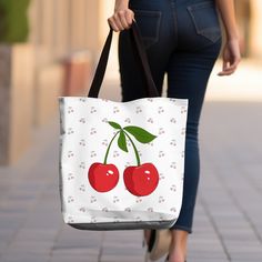 🍒 Cherry Coquette Print Tote Bag - Sweet & Stylish Accessory! 🌸 Indulge in the whimsical charm of our Cherry Coquette Print tote bag! Adorned with delightful cherry motifs and flirty accents, this bag is perfect for adding a touch of sweetness to your everyday ensemble. Features: 👜 Chic and compact design (16" x 16") for easy carrying of essentials. 🍒 Vibrant cherry coquette print adds a pop of color and personality. 💃 Durable canvas material ensures long-lasting use and style. 🌸 Perfect for trips to the farmer's market, picnics, or a day out with friends. 🎨 Available in a variety of colors to suit your personal taste. Elevate your look with the playful charm of our Cherry Coquette Print tote bag. Whether you're running errands or enjoying a day out, this adorable accessory is sure Cute Rectangular Shoulder Bag For Gifts, Cute Rectangular Shoulder Bag - Gift Idea, Cute Rectangular Shoulder Bag As Gift, Cute Red Bags For Valentine's Day, Cute Red Bags For Gifts, Cute Red Bag For Gift, Cute Canvas Shoulder Bag For Gifts, Cute Canvas Shoulder Bag For Gift, Cute White Bags For Valentine's Day