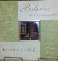 an advertisement for a gift shop with pictures and words on the wall behind it that says, believe all things are possible each day is a gift