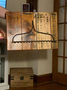 a piece of wood that has been made into a light fixture with wires attached to it